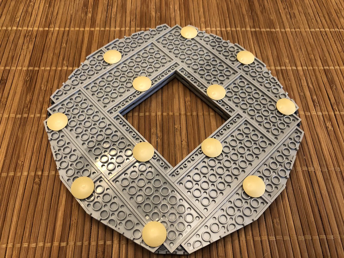 ... but it gets more exciting when we start expanding it to a circular shape and adding the 2nd and 3rd layers. The bottom has some slides that also provide some stability across the plate junctures.  #LEGO  
