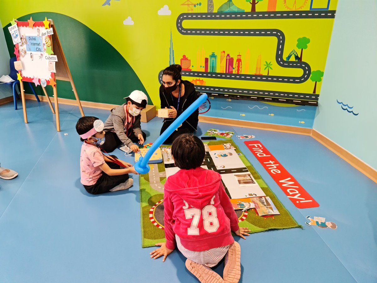 MaryMSavio's tweet photo. We are finding our way to the day camp area using a cubetto @gemsnms_alkhail @NMSKindergarten https://t.co/OvYMnQZgQc