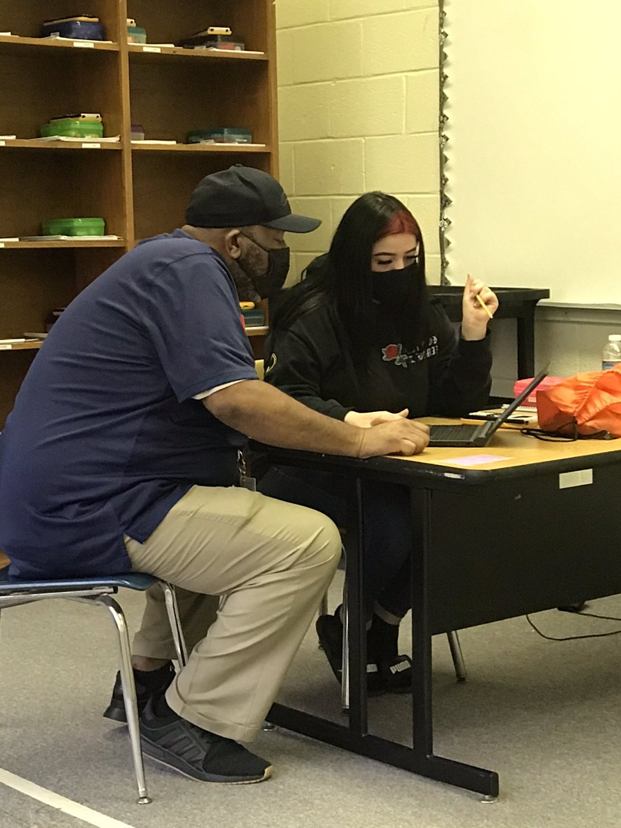 CLC_Pinckney's tweet photo. Mr. Moultrie and Ms. Cagle are providing individualized instruction to two of our seniors in their last math classes. #PinckneySTRONG #wegotgoals #Classof2021 #alted https://t.co/dmVgFkxxtm