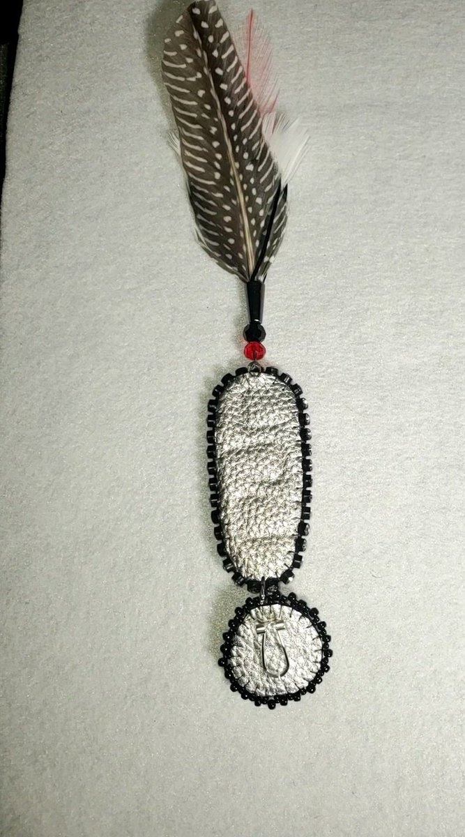 TommieErika's tweet photo. My first attempt at three tiered earrings? What are your thoughts? Yes they are long...9 inches. This is also my first tweet ever..show me some love. Looking for feedback.  Thinking about switching out the feathers? #NativeBling #Dakota #NativeAmerican #beadwork #ISANTI #Sioux https://t.co/o1awtawgGc