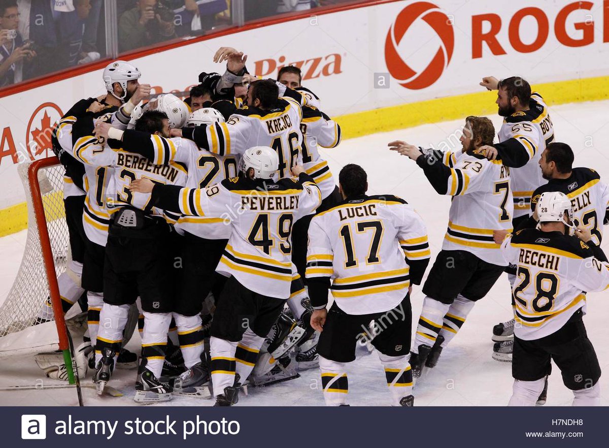 To many the lasting image of Z is of him lifting the Cup in the air, knocking his hat off, but for me it's these. The clock has reached 0.0 and he towers over his teammates, welcoming them as they come to celebrate