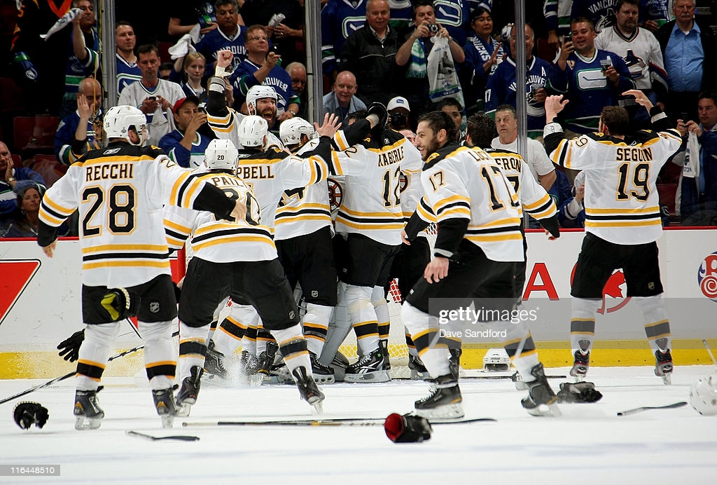 To many the lasting image of Z is of him lifting the Cup in the air, knocking his hat off, but for me it's these. The clock has reached 0.0 and he towers over his teammates, welcoming them as they come to celebrate