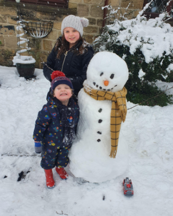 Even more fun in the snow. Say hello to Francis the snowman with his school red scarf!
