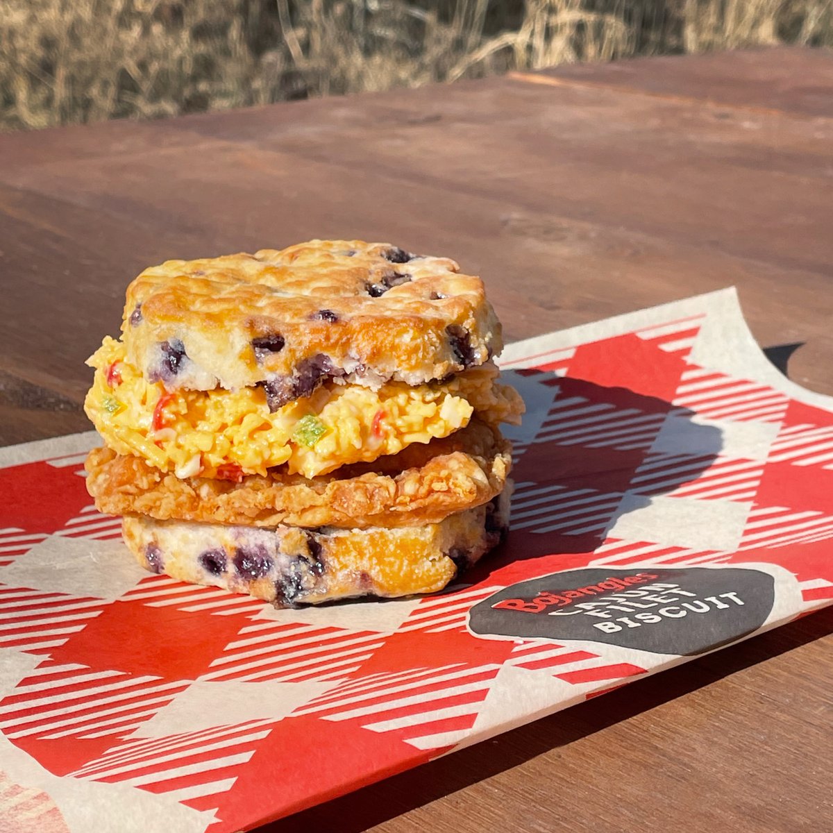 Bojangles's tweet photo. A happy accident? Or a new Secret Menu Item? A Cajun Filet with Pimento Cheese on a Bo-Berry Biscuit?!

It's... The Uva 🤯 (Courtesy of @Mike_Uva) https://t.co/eaau0dhpgS