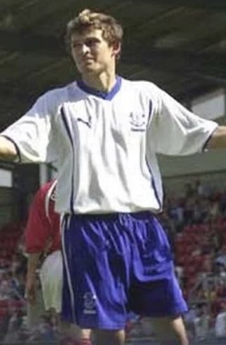 #207 Wrexham 0-2 EFC - Aug 3, 2002. EFC, back from Scotland, ventured to Wales to face Wrexham at the Racecourse Ground. EFC won 2-0 with goals from Tomasz Radzinski & newly-signed-on-loan Juliano Rodrigo. Chinese signings Li Tie & Li Wei Feng made their EFC debuts in this match.