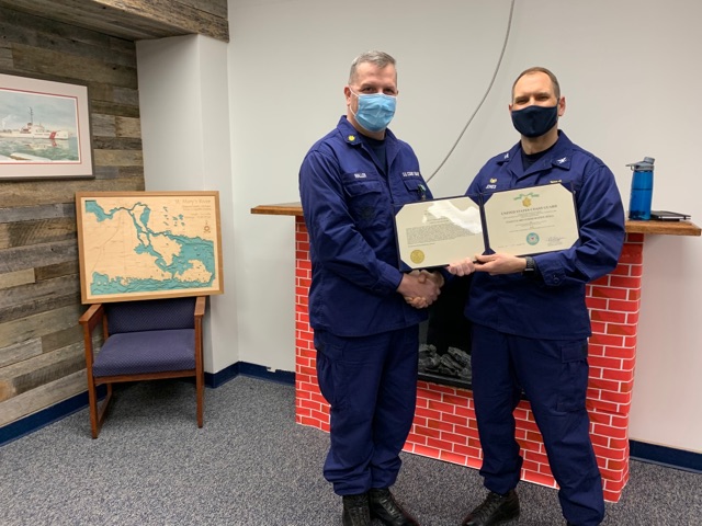 Captain Anthony Jones congratulates Lieutenant Commander Matthew Waller on receiving the Coast Guard Commendation Medal for his work while serving as Senior Reserve Officer at #USCG Marine Safety Unit in Cleveland, Ohio. #USCG #USCGR #RESERVE #CGCM