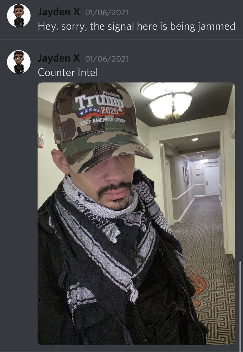 His infamous “Counter-Intel” photo wearing a Trump 2020 hat.