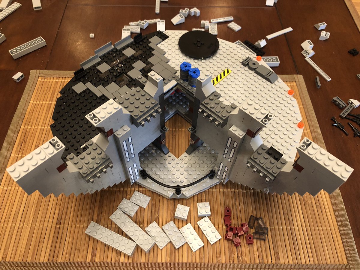 In each photo are the blocks for the next step, since I can’t really zoom in and show much detail. Here we see some red blocks halfway up each doorway.  #LEGO  