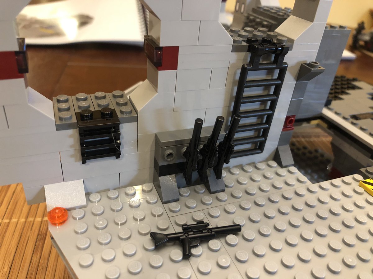 Now we are at the top! A layer of thin plates across the top tie the supports together. We also build this flexed support bar across the open section, then add a ladder and stock a gun rack. Section 2 took a few hours across last night and tonight, it’s huge!  #LEGO  