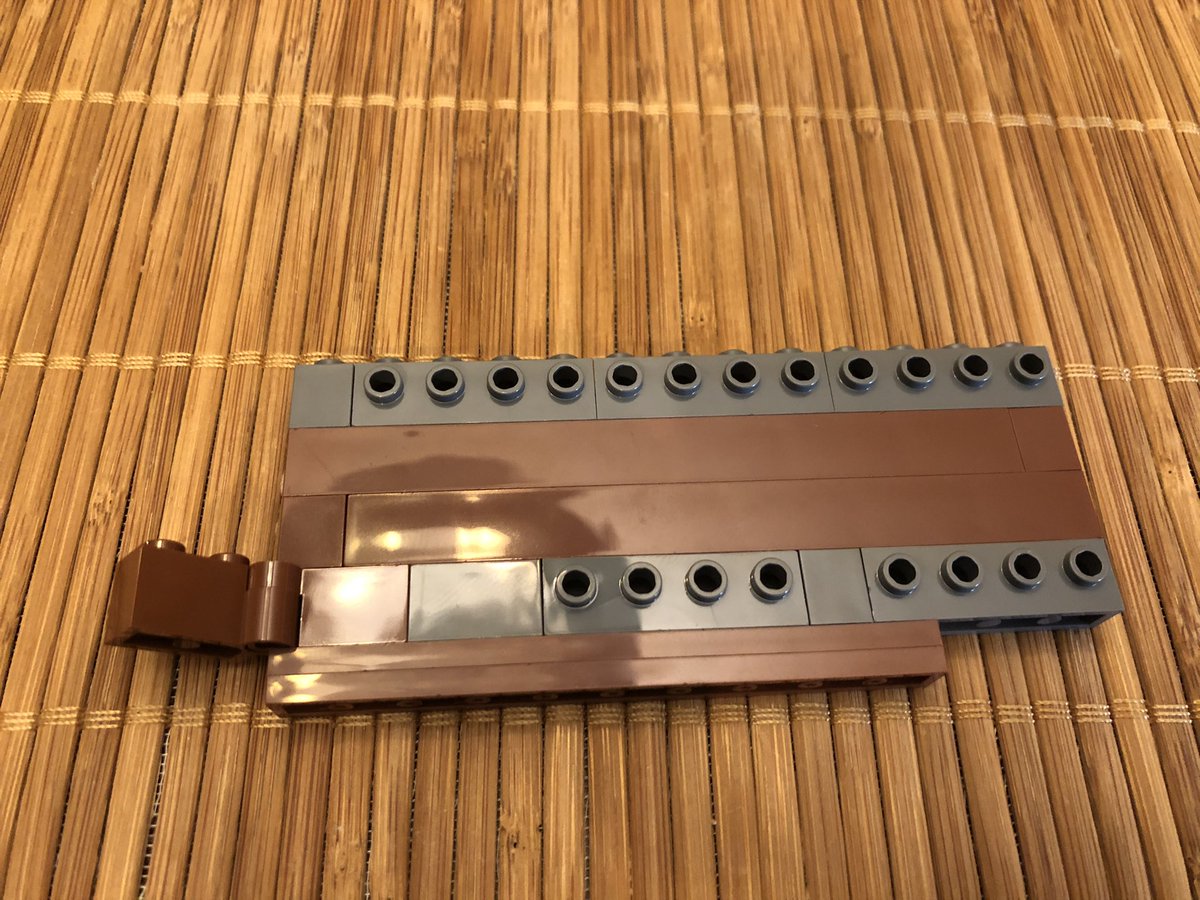 Next, we build a hinged panel. It’s pretty big, and has a single axle hanging off the top.  #LEGO  