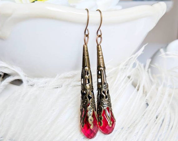 PapillionEra's tweet photo. Long red earrings, ruby https://t.co/YTgbiGRk8m via @EtsySocial #torontostyle #shoplocal #Longredearrings #rubyredearrings https://t.co/tst9mUWMa6