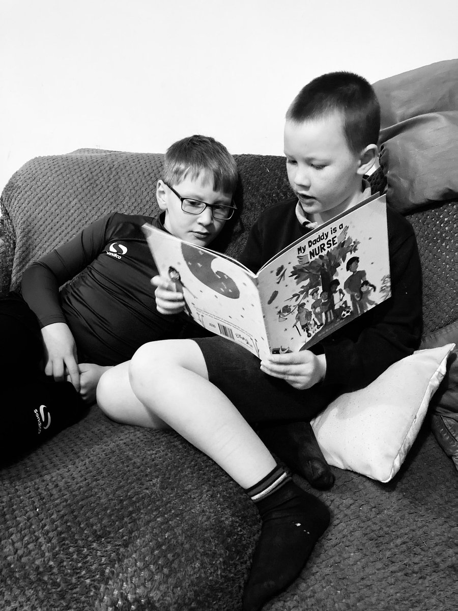 My sons reading an awesome book #mydaddyisanurse #yearofthenurseandmidwife @CNOEngland