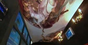 okay this one I kinda respect. a truck with the Creation of Adam on it’s ceiling with little chandeliers is kind of a vibe?