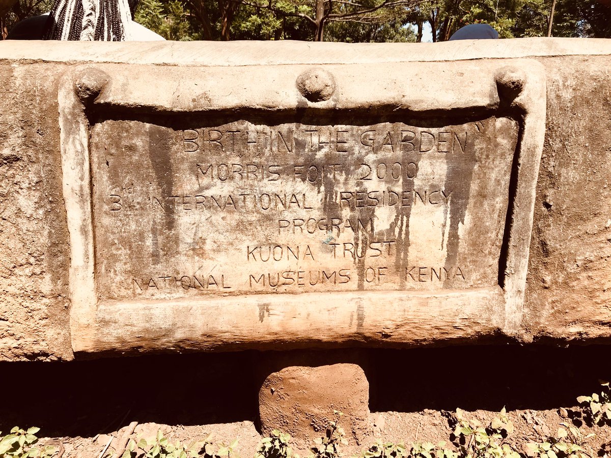 Back to the garden.The original metallic benches are said to have been smelted to make weapons in World War Two.One of the current benches is watched over by two figures holding a child. Apparently inspired by a woman who gave birth there as the sculptor was commencing work.