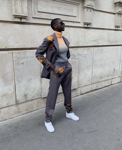 She be wearing tf out of suits