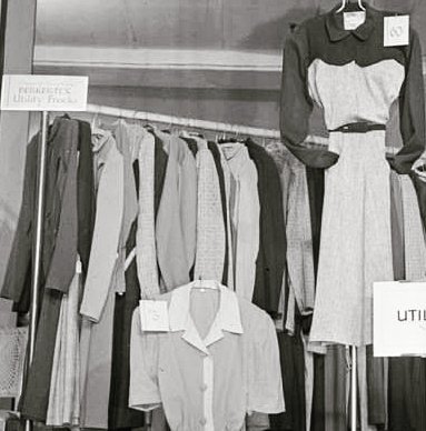 Diary_DressHist's tweet photo. A shop display of Utility clothing designed by Norman Hartnell. The sign on the clothes rail reads "Berketex Utility Frocks".
📷 Ministry of Information, c.1942-1943.
#DTH #CC41 #UtilityClothingScheme https://t.co/laUyI15aJC