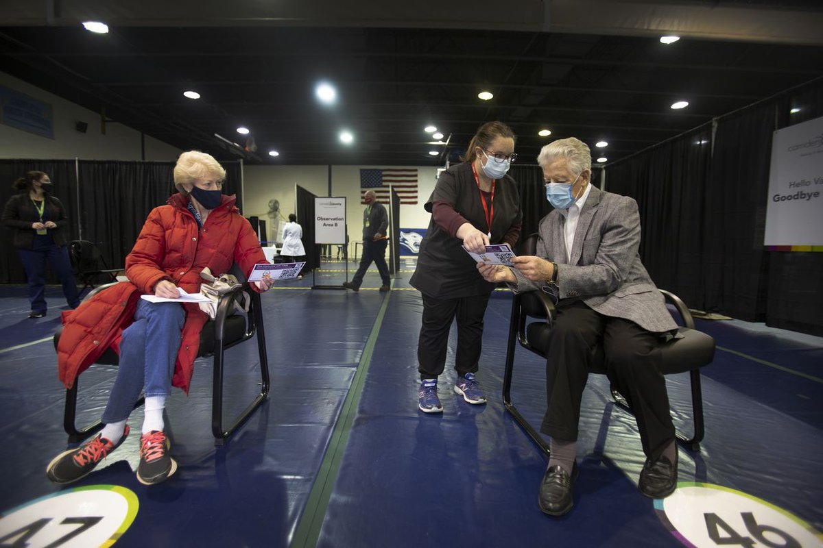 We're proud of the <a href="/RUCamdenNursing/">RutgersCamdenNursing</a> volunteers assisting with local COVID-19 vaccination efforts. Pictured here: Clinical Assistant Prof. Rachel Derr with former NJ Gov. Jim Florio RLAW'67 and his wife Lucinda, after the couple received vaccines yesterday. nj.com/coronavirus/20…