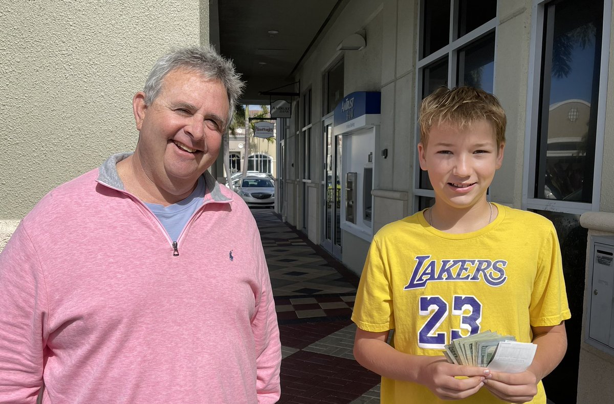 Lighthouse_Of_C's tweet photo. Owen presents Scott Flagel, CEO with $1,725.00 in donations he collected online during the holidays for Lighthouse of Collier. https://t.co/x0s7HMsrBD