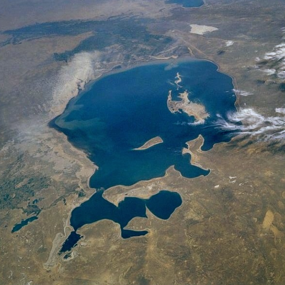 b_nishanov's tweet photo. The Aral Sea, once world's 4th largest lake, began shrinking in the 1960s after the rivers that fed it were diverted for Soviet irrigation projects. These NASA photos show the incomprehensibly quick rate at which the water reserves depleted. 1st photo is 1985, 2nd '97, 3rd 2014. https://t.co/XPgmKsGRp5