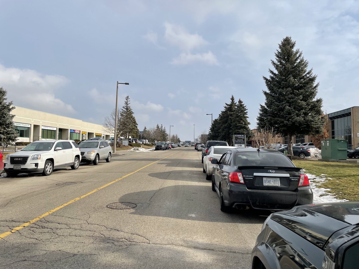 Another manufacturer nearby. Filled parking lot overspill into road. Is this essential???  #vaughan