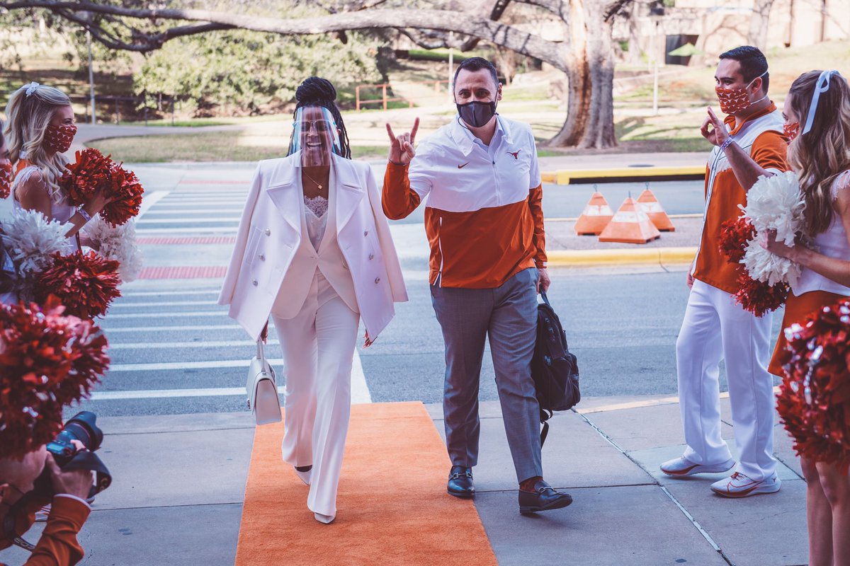 LonghornPod's tweet photo. Can we just take a second to appreciate the new First Lady of @TexasFootball and the greatest Sneakerhead in the league? UT has style for days. https://t.co/nqSg8lB2d3