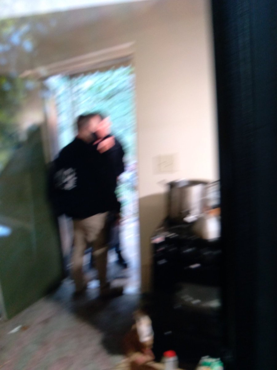 Here's the official press release -  https://www.justice.gov/usao-ndfl/pr/tallahassee-man-arrested-inciting-violence-florida-capitol-buildingSeveral more images- picture of him in his security guard uniform, him being arrested, and him fighting with YPG as a sniper