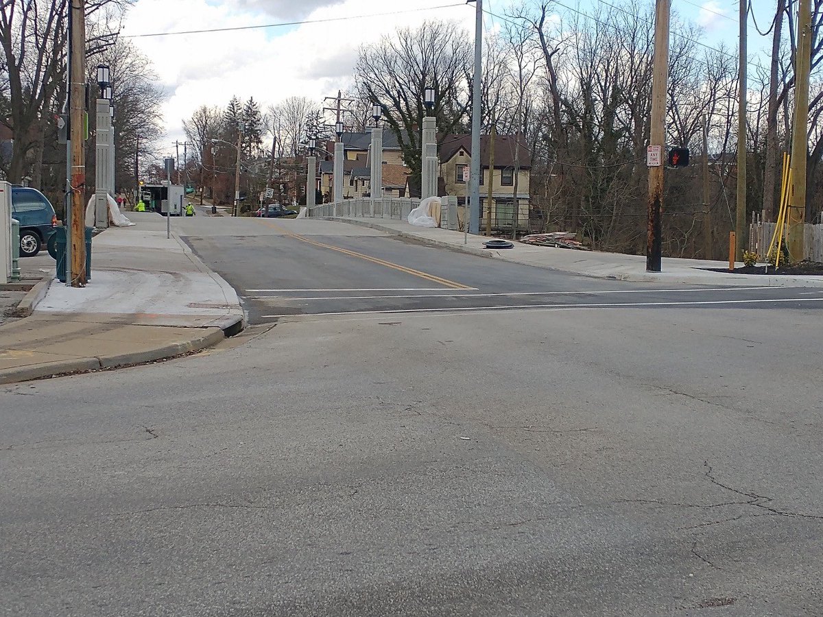 WeMoveCincy's tweet photo. Kennedy Heights, Jan. 15: The Kennedy Ave Bridge near Woodford Rd has reopened a day sooner than expected! Crews will be on site next week to complete concrete surface work &amp; lighting. They will return in spring to apply waterproofing, permanent line striping &amp; security fencing. https://t.co/2MnjHiTZTD