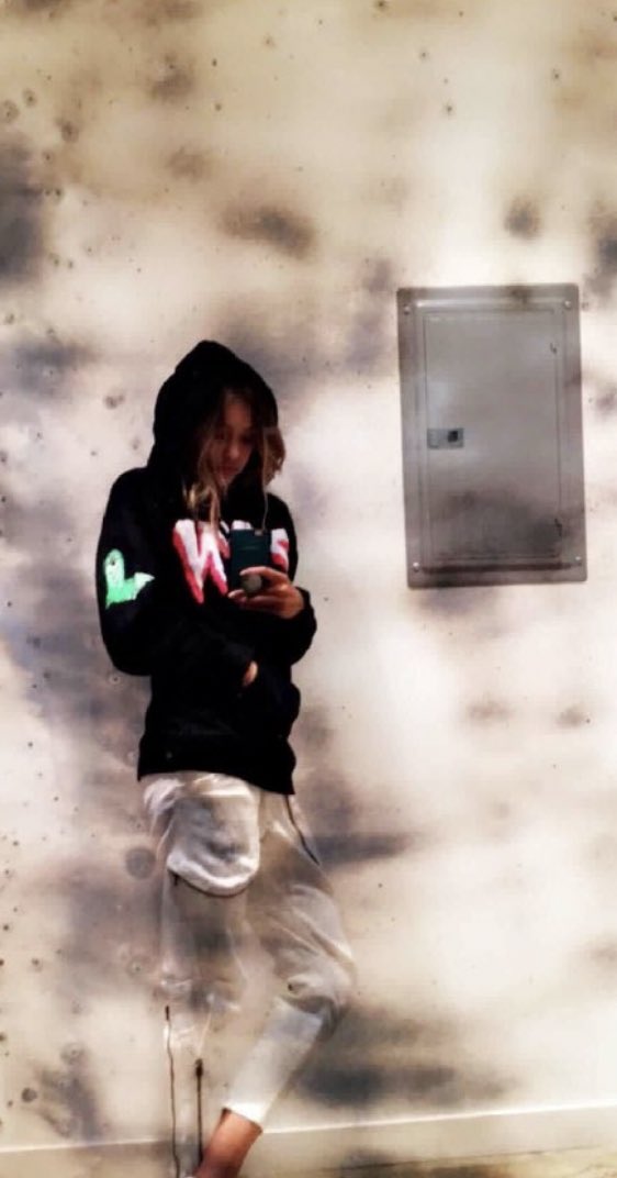 she wearing his merch