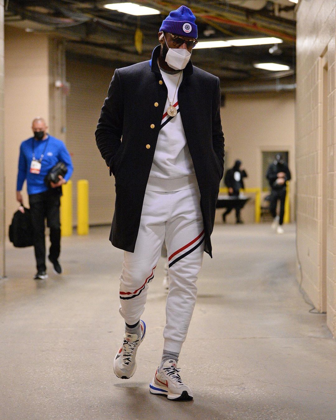 Thom Browne on X game time lebron james wears a thom browne navy cashmere coat and a white jersey sweatsuit with red white and blue stripe detailing pre lakers game KingJames