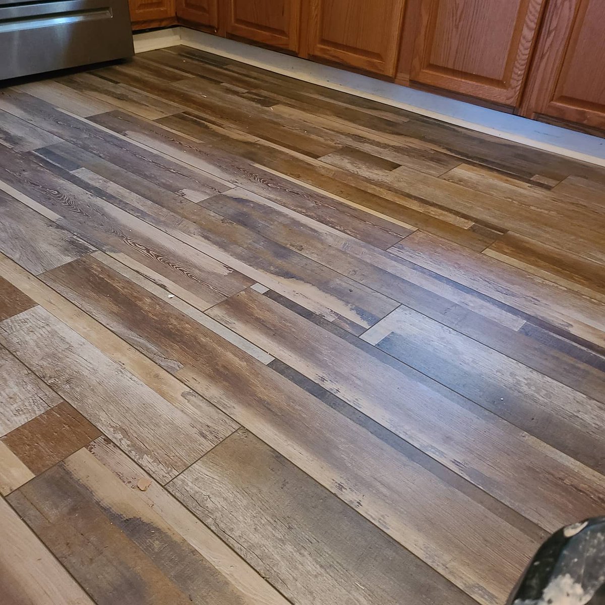 Do you need a new kitchen floor??? Call Nails Home Maintenance they can install you a new one!!! 740-995-6312