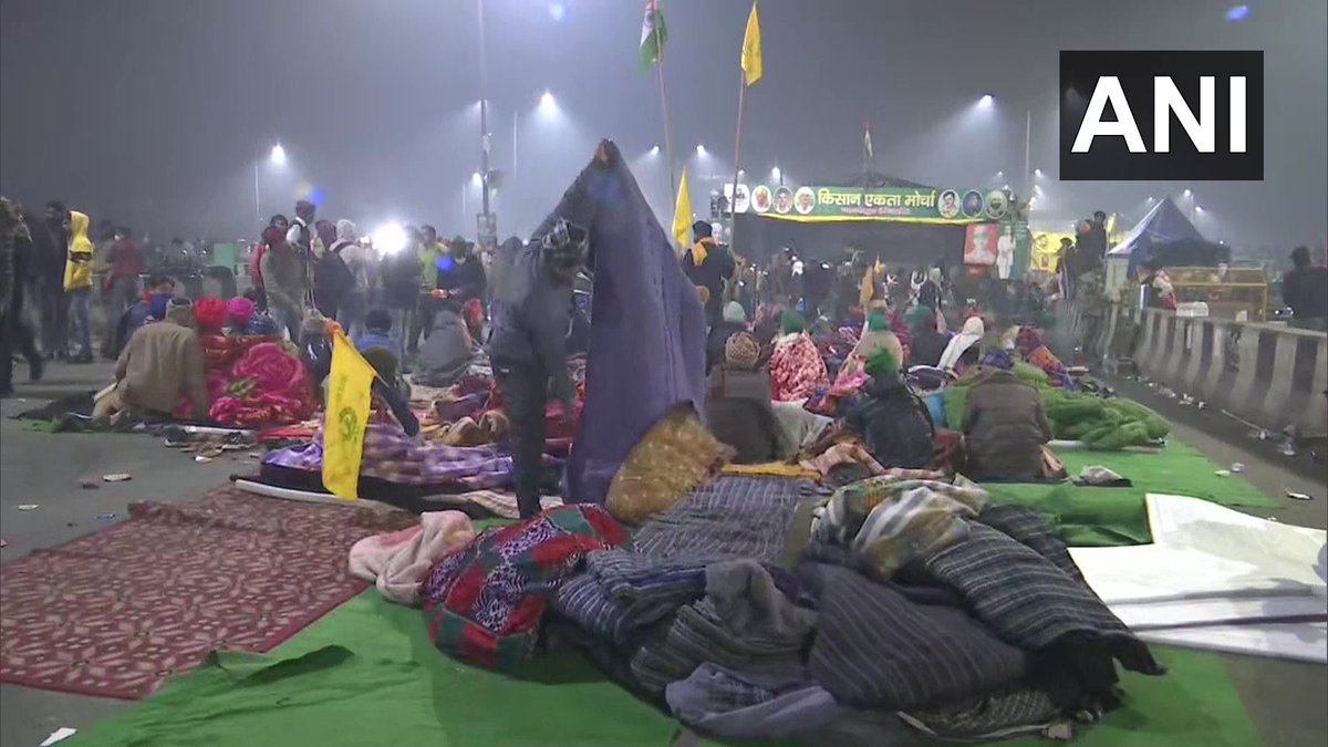 ANI's tweet photo. Sit-in protest at Ghazipur border (Delhi-Uttar Pradesh) continues against the Centre's #FarmLaws. https://t.co/BOaVAGbAeK