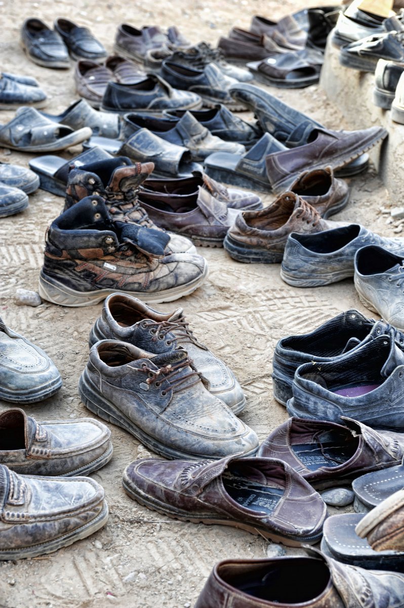 Some of the shoes left outside the Shura  #TenYearsOn  #Herrick13