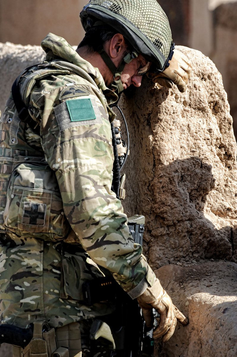 The  @3PARA CO listening to his interpreter, translating the speeches.  #TenYearsOn  #Herrick13