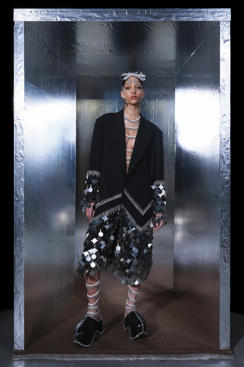 'Their 14-look couture debut showcases that range, and their lookbook, which stars Precious Lee and Yasmin Wijnaldum, is a sort of statement of intent.' See every look from @AREA_NYC_'s spring 2021 couture collection and read our full review: vogue.cm/Mxr2Xrf