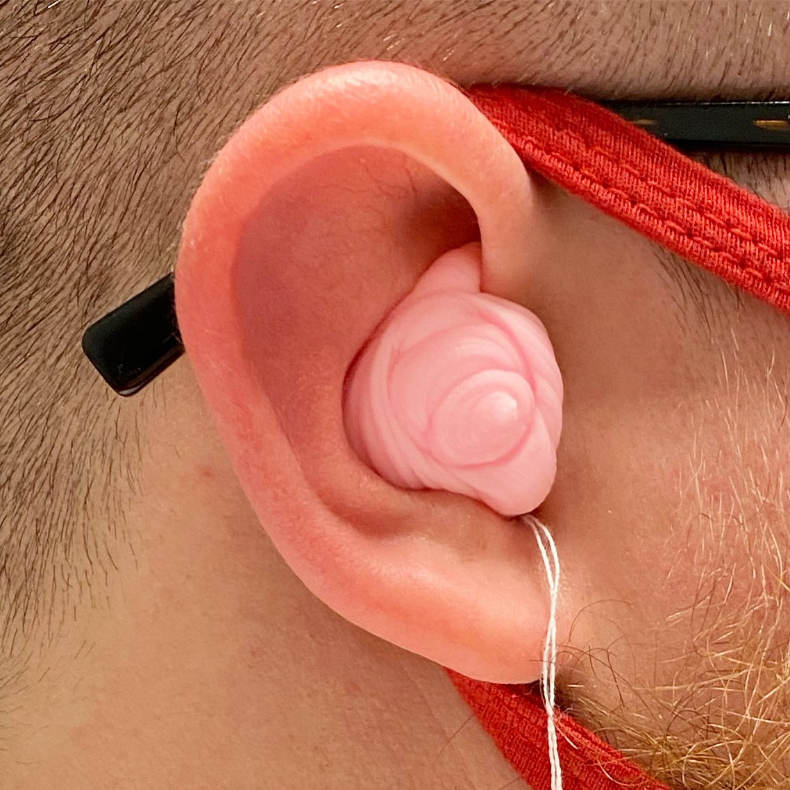 HearingDocJosh's tweet photo. It’s always fun getting to teach the students how to do ear mold impressions. They learn on models, fake heads, and then finally on me. This one was pretty good for someone’s first try ever don’t you think?
.
#audpeeps #audiology #cochlearimplant #drgingerbeard https://t.co/eOA8rJTRgP