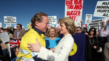 We printed some authentic looking "home made" signs so our "protest" looked ligit.I wore high vis so the working class could identify with me. @HonJulieBishop came along too!It worked!We "Axed the Tax" & took billions from the Australian public.Yummy money!7/15