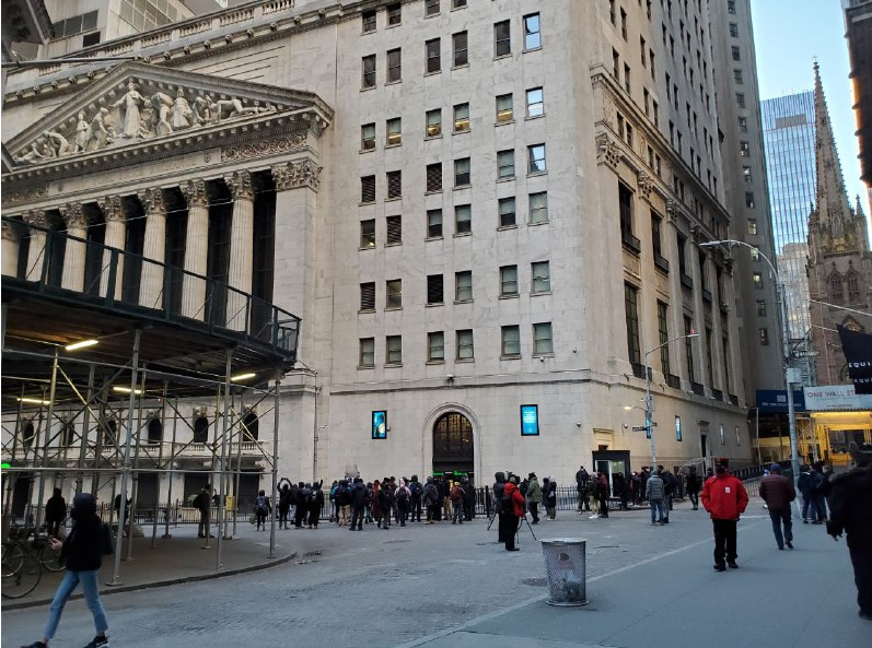 A few dozen people have gathered outside the New York Stock Exchange so far. One attendee is heard chanting, "Robinhood has got to go," and "We want a free market."
