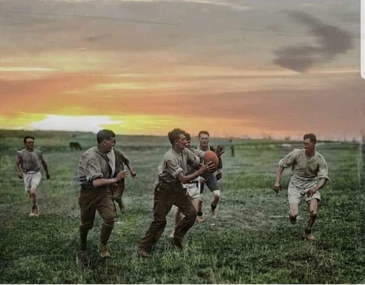 AndrewRLP's tweet photo. A colourised picture of WWI soldiers playing Rugby League on the battlefield after peace was declared. https://t.co/PjIkg8a79l