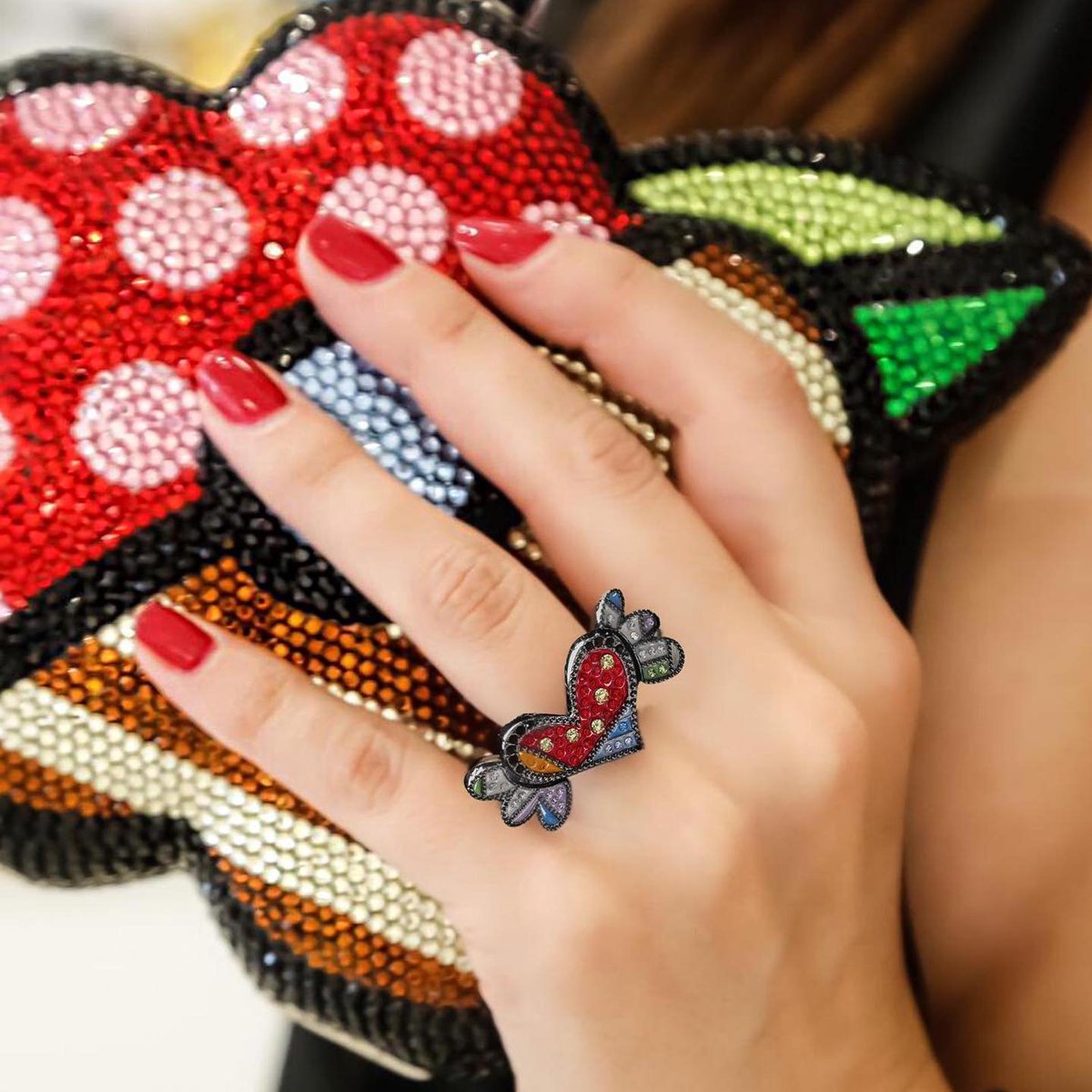 oriannecollins1's tweet photo. Give the gift of love this Valentine's Day with the Romero Britto Collaboration Pendant/Ring in Silver with Enamel Details and Swarovski Crystals. #OurOCStyle https://t.co/JKYJGXESgX