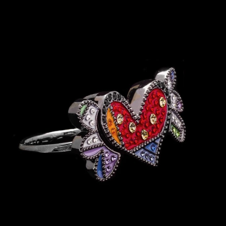Give the gift of love this Valentine's Day with the Romero Britto Collaboration Pendant/Ring in Silver with Enamel Details and Swarovski Crystals. #OurOCStyle
