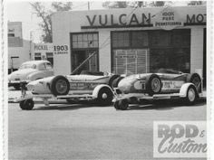 Main Street Garage...  Open Trailers...   Headed to the Brickyard perhaps.  We love everything this photo represents.