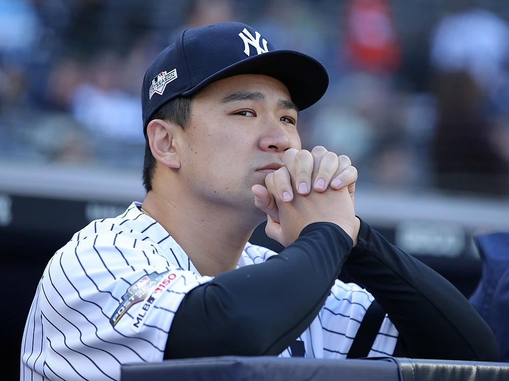 Masahiro Tanaka returns to Japan after 7 seasons with Yankees