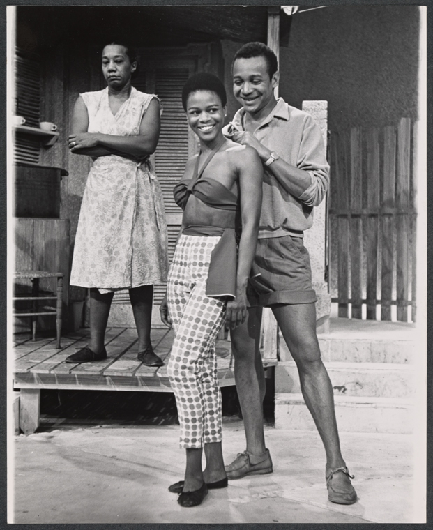 "Vinnette Carroll, Cicely Tyson, and unidentified actor in the stage production Moon on a Rainbow Shawl." 1962.Source:  @nypl