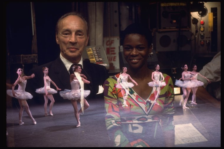 "New York City Ballet production of "Symphony in C", actress Cicely Tyson visits George Balanchine backstage, (superimposed over dancers)." 1973.