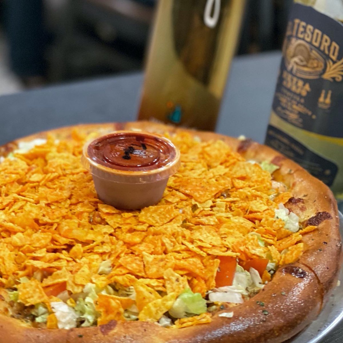 SaucedTexas's tweet photo. Pizza.. Let's Taco Bout It.. #TheTexican 

Seasoned Beef, Mozz, Freshly Shredded Lettuce, Roma Tomatoes, Topped with Freakin @Doritos and served with our #housemade taco sauce. Come and get it. https://t.co/AVmHqdxUQ1