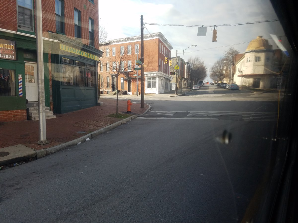 As we continue down Baltimore St, we are in an area that has a strong main street feel but is suffering the effects of redlining, disinvestment, and white flight. Compare it to this picture from 1930 before blockbusting. We also pass Union Square, which is an awesome little park