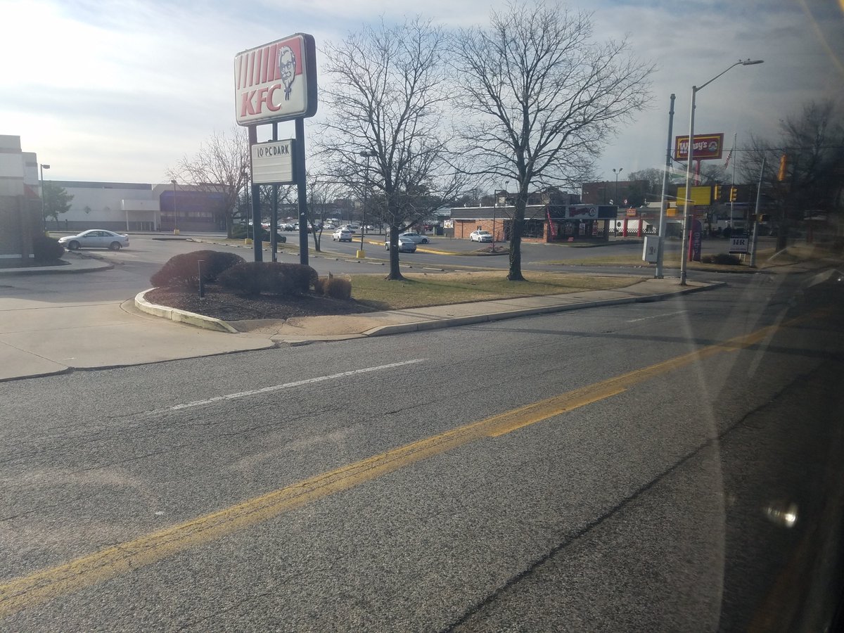 In the middle of dense rowhouses, we have this strip mall, straight out of suburbia. Satellite imagery since 1937 shows that it was used as some kind of nonresidential, then as a strip mall with a massive parking lot, then two strip malls.