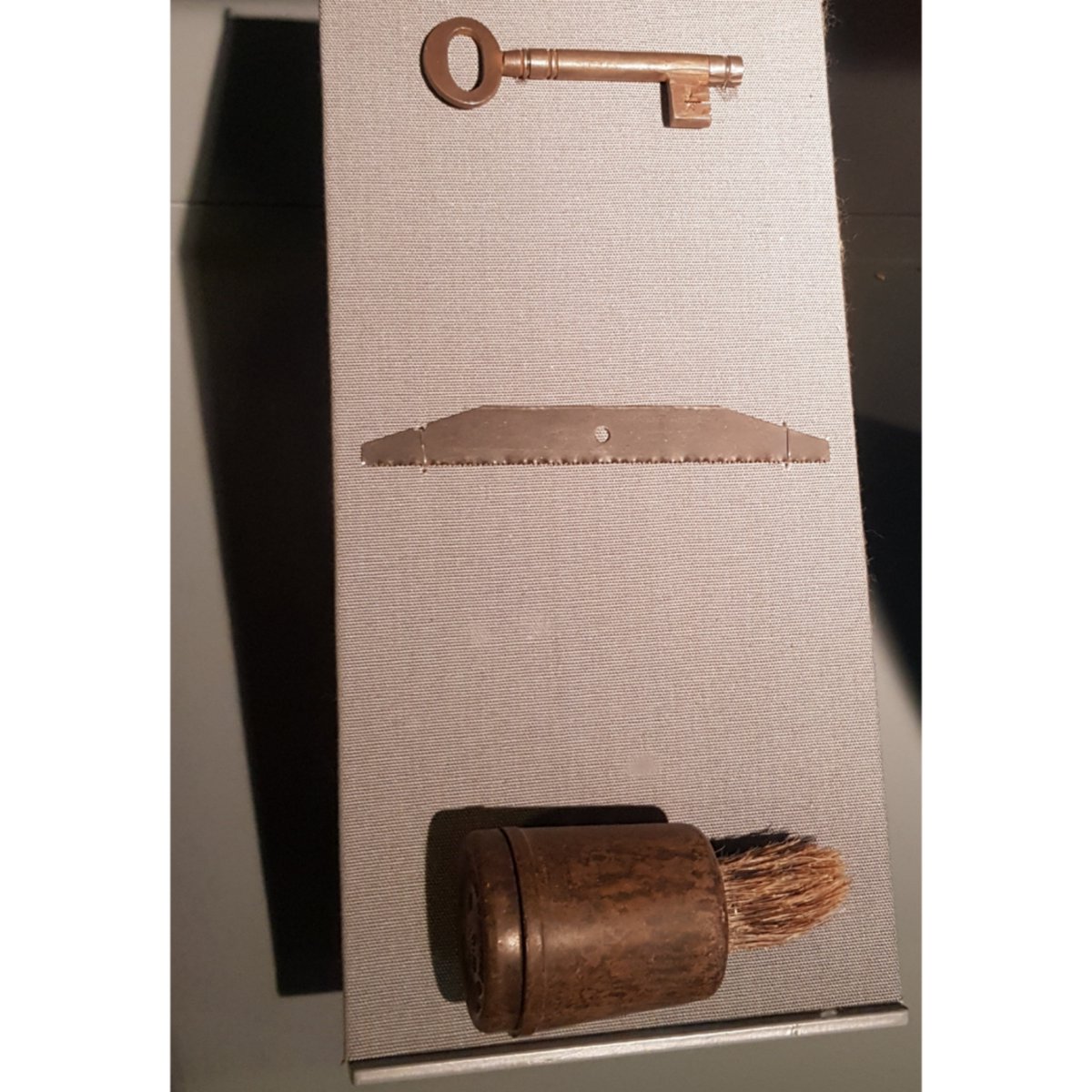 For today's  #BehindTheScenes we take a look at some objects in our Special Operations Executive (SOE) display. Here we have some unsuspecting  #WWII items, a shaving brush, a small saw, and a door key. However, all three are in fact escape aids!  #MuseumFromHome