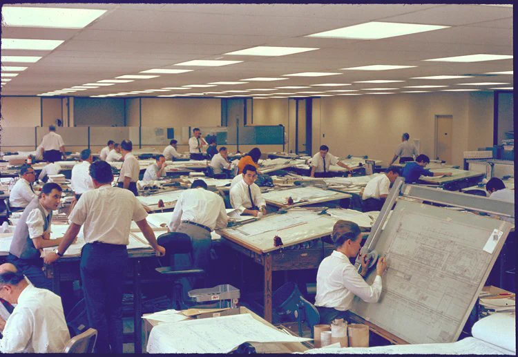 Historical photos of Bechtel engineers at work in offices. 