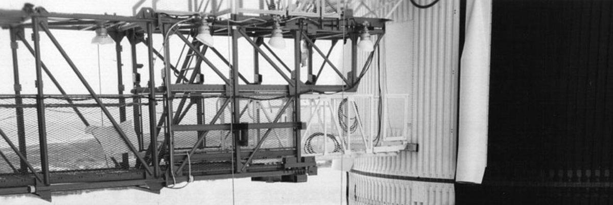 Arm 3.Gave technicians access to service the 5 J-2 engines on the second stage.